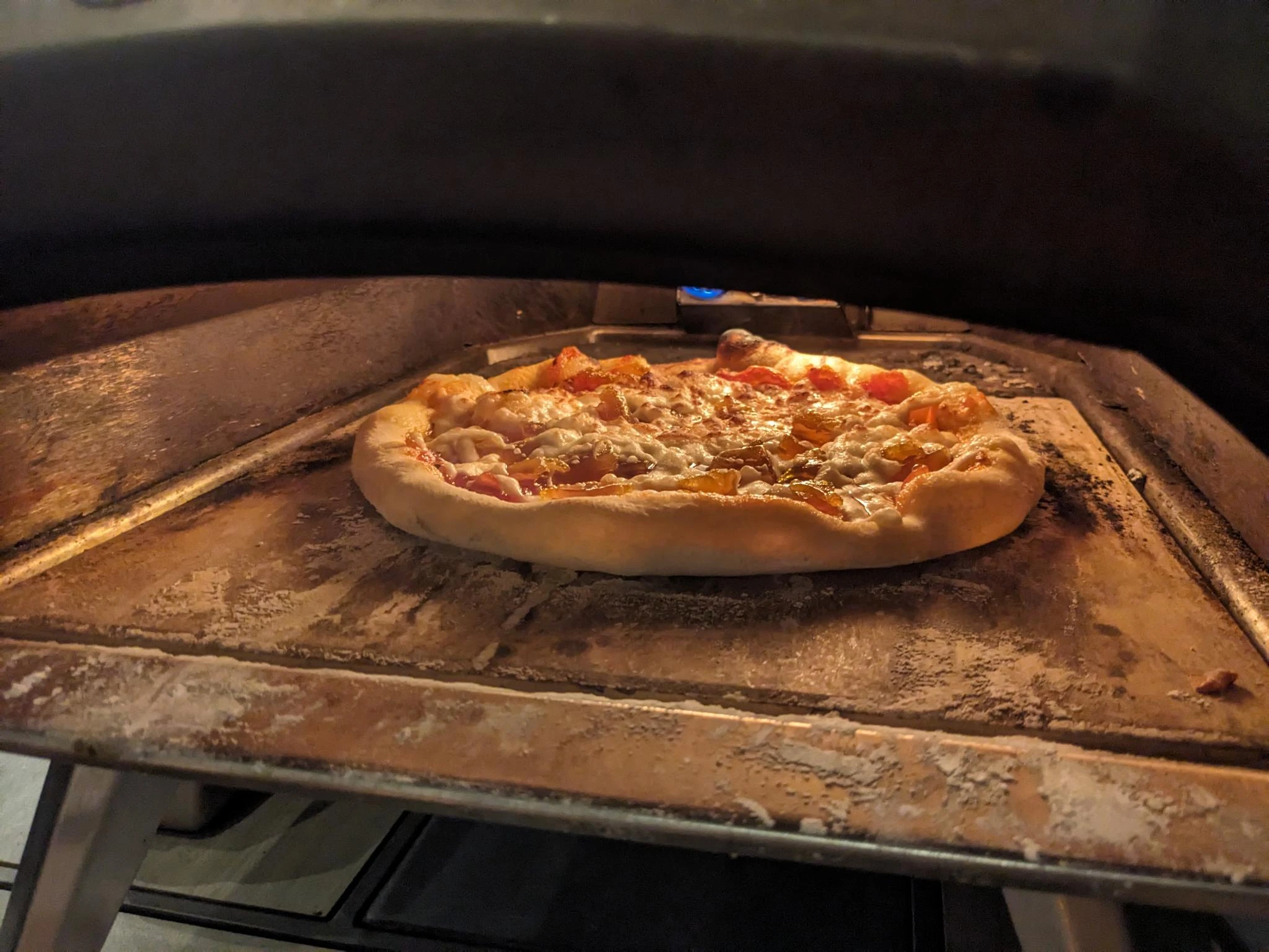pizza baking in a home oven